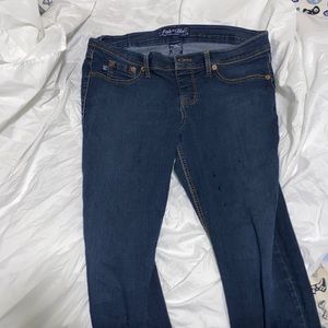 Faded blue jeans fits like a large size 13